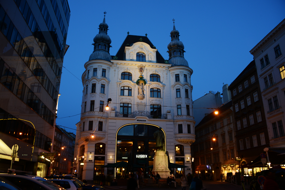 Historic architecture illuminated at night in Vienna