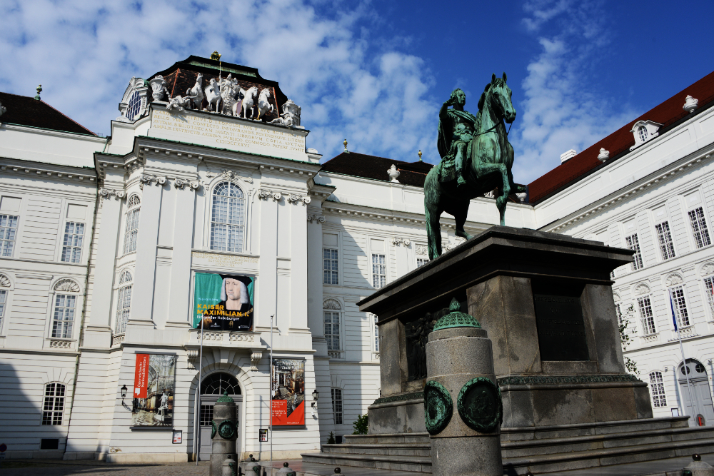 Courtyard and historic buildings at Hofburg Palace in Vienna