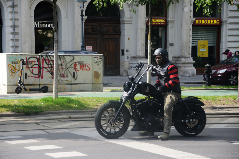 Motorcycle parked among historic buildings in Vienna