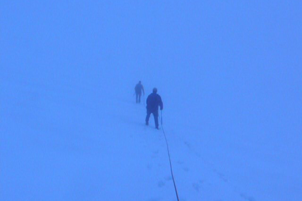 Rope team descending Mt. Garibaldi in poor visibility