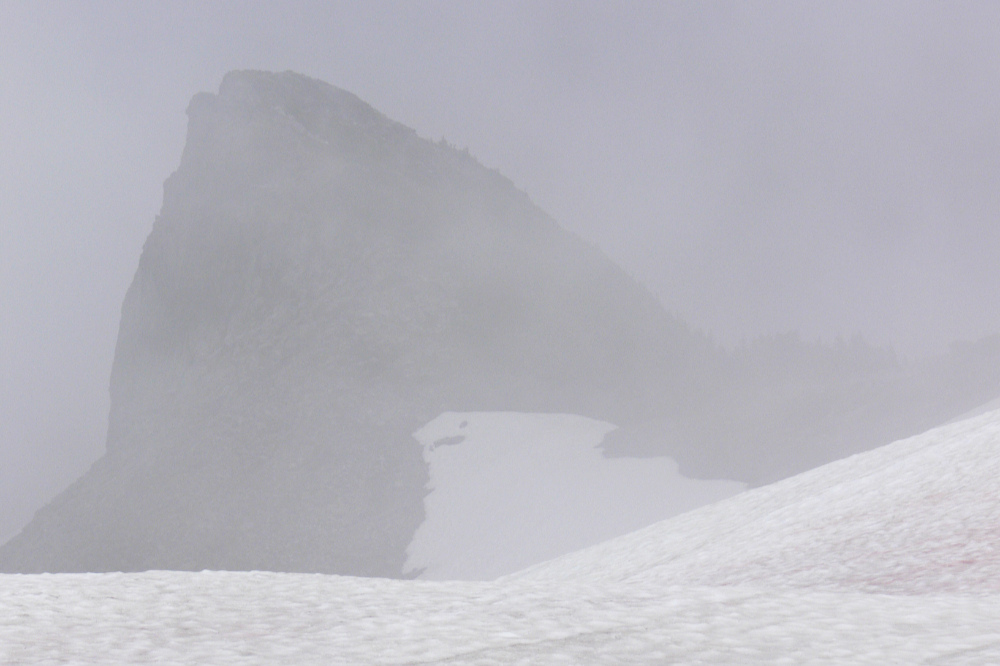 Sharp rocky formation rising above the glacier on Mt. Garibaldi