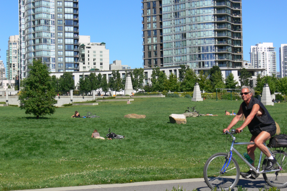People relaxing in a waterfront park in Vancouver