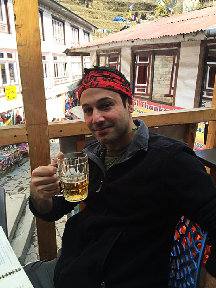 Enjoying a beer in Namche Bazaar after a Mount Everest expedition