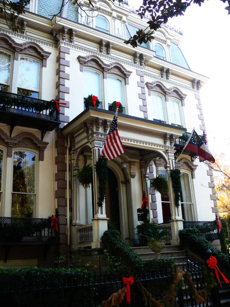 Traditional Southern Home in Savannah Traditional Savannah home displaying American and Georgia flags from its porch