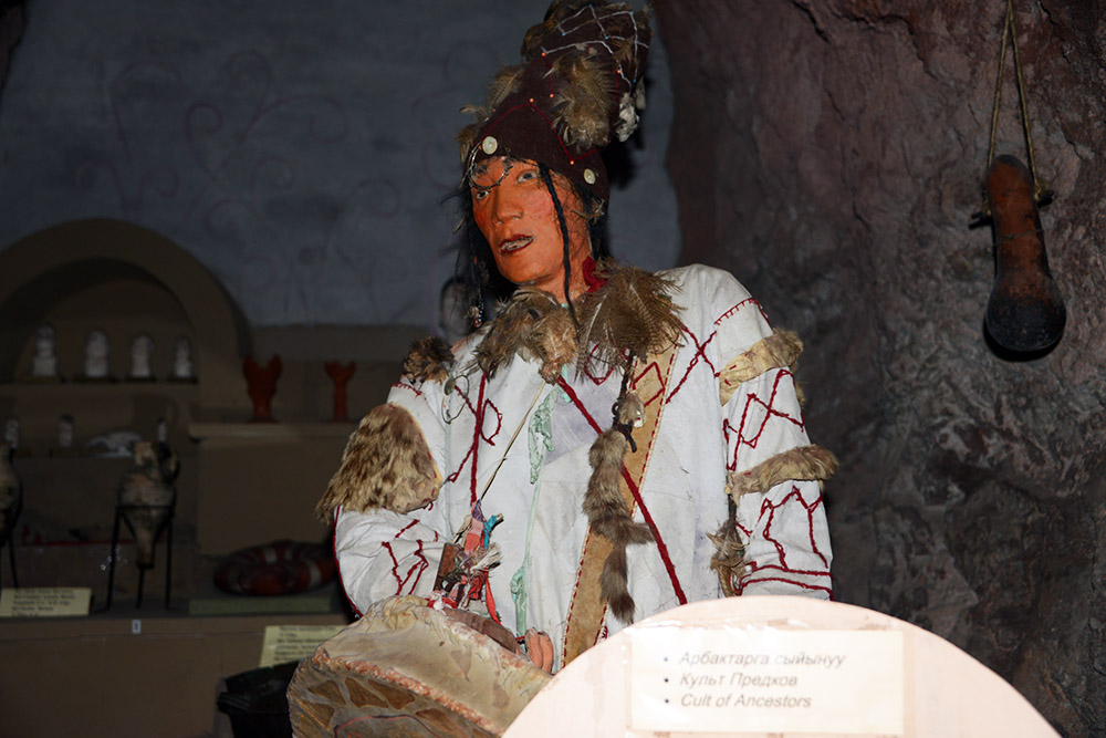 Traditional Kyrgyz Clothing Traditional Kyrgyz clothing and cultural displays inside the cave museum