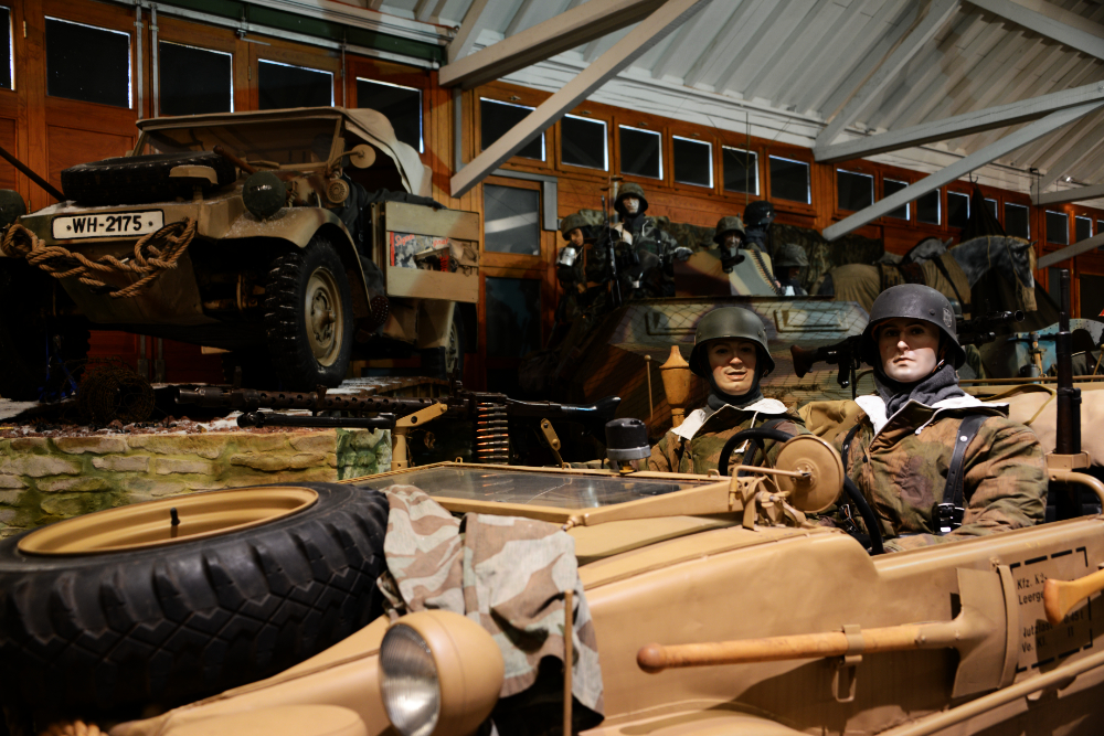 Military equipment inside the museum Military vehicles and historical equipment displayed inside the Diekirch military museum