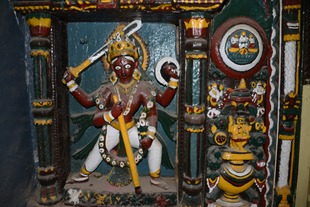 Detailed traditional artwork decorating the former Royal Palace in Kathmandu