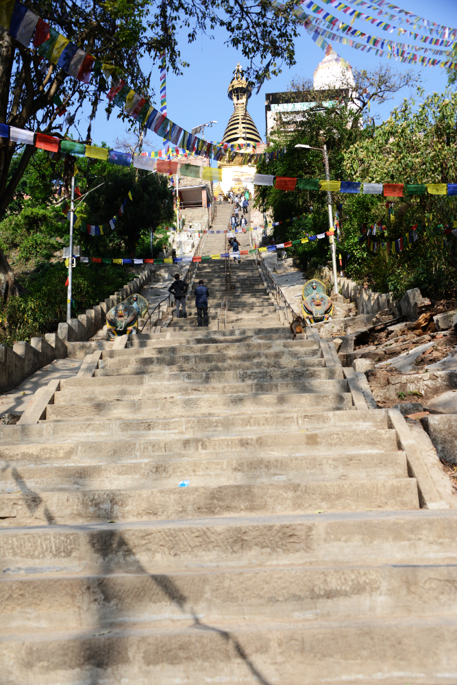 Steep staircase ascending toward Swayambhunath Temple in Kathmandu