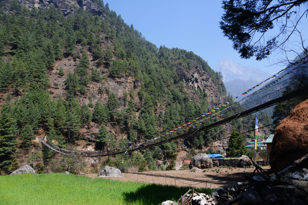 Suspension footbridge crossing a mountain river in Nepal's Khumbu Valley