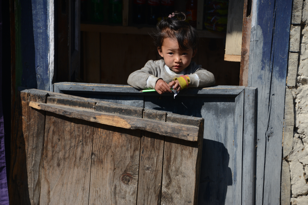 Young girl in a village along the Khumbu Valley trekking route in Nepal