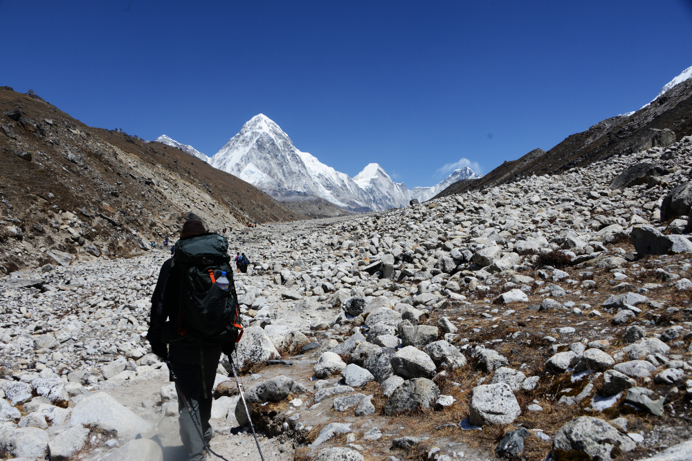 Hiking through the high Himalayan landscape near Lobuche in Nepal