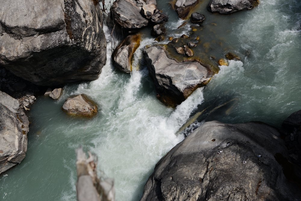 Rushing Himalayan river rapids along the Khumbu Valley trekking route