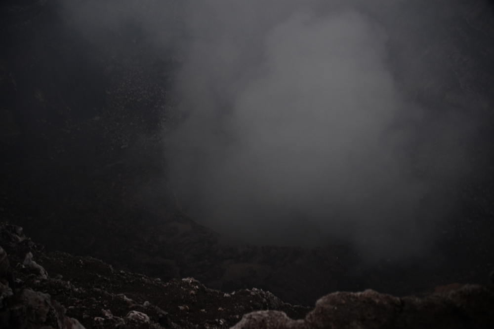Volcanic crater and sulfur dioxide gas plume at Masaya Volcano in Nicaragua