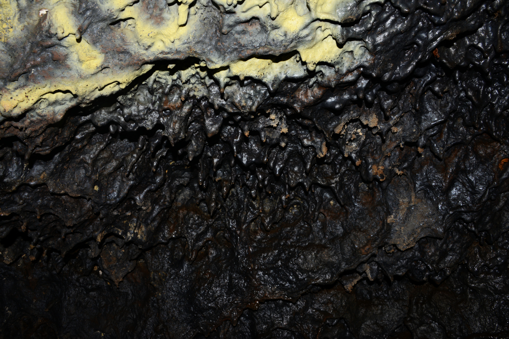 Dark interior of a volcanic lava tube at Masaya Volcano National Park