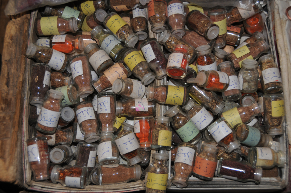 Small vials of spices or incense for sale in Kano market
