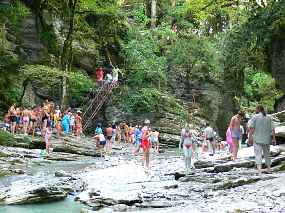 Swimming in a mountain river near Sochi Russia