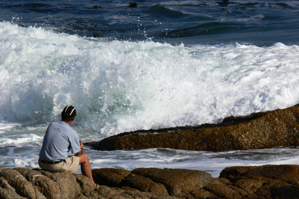 Cape Town Coast Man watching waves along the Cape Town coast