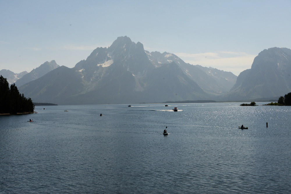 Kayakers in the Grand Tetons Kayakers enjoying the lake in Grand Teton National Park